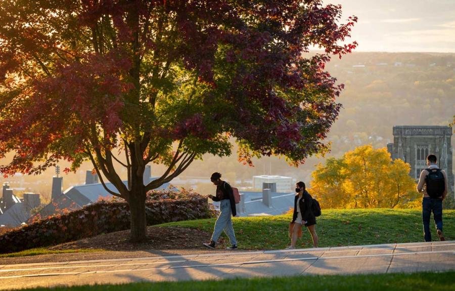 Students walking outside during autumn