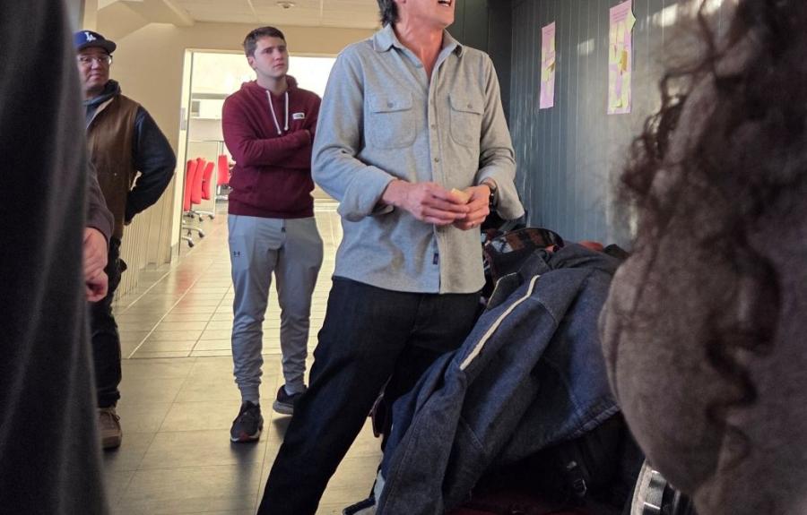 Derek Chang reads trivia questions about Spring semester courses. 